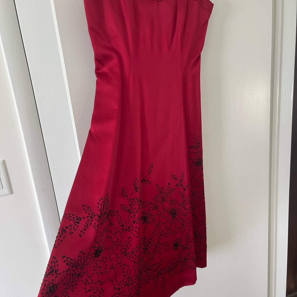 Strapless silk with gorgeous beading, no tags but size six